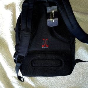 Large backpack with numerous compartments,padded computer,phone,books,etc.